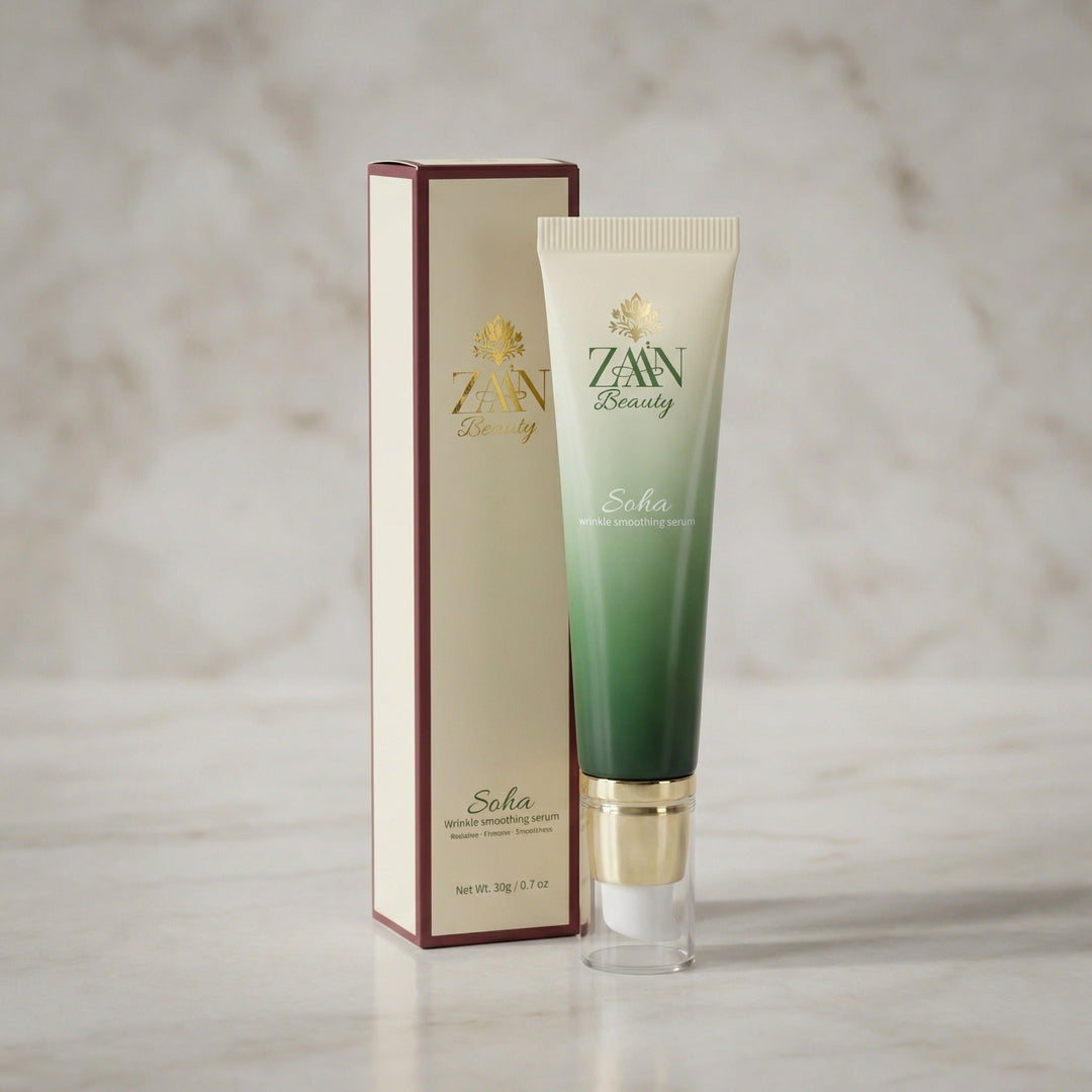 SOHA Wrinkle Smoothing Serum — cream and green gradient tube with gold pump beside the ZAA'N Beauty box on marble.