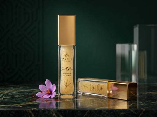 SERAANIYA Saffron Lip Mask on emerald marble with saffron crocus flower